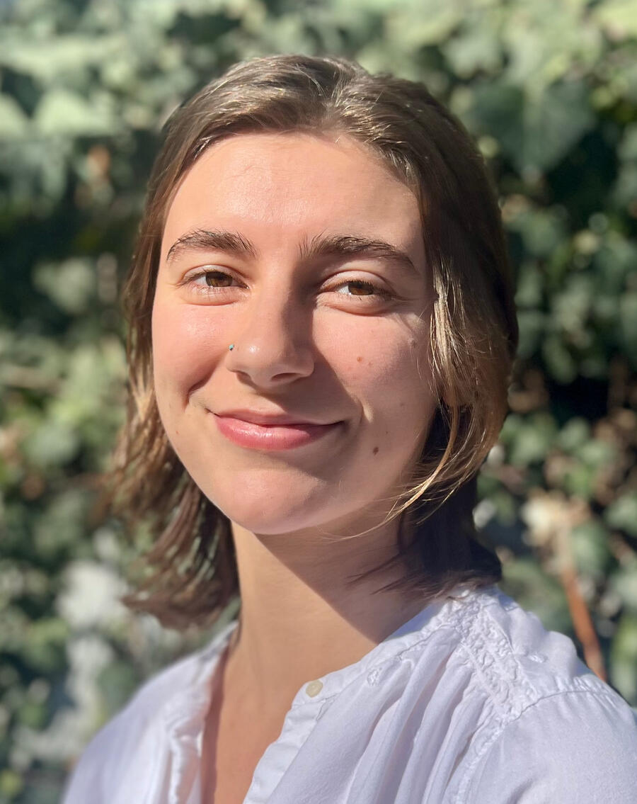 Bailey Danielle, massage therapist trained in Ashiatsu barefoot massage and Thai bodywork, focused on strength, mobility, and healing touch.